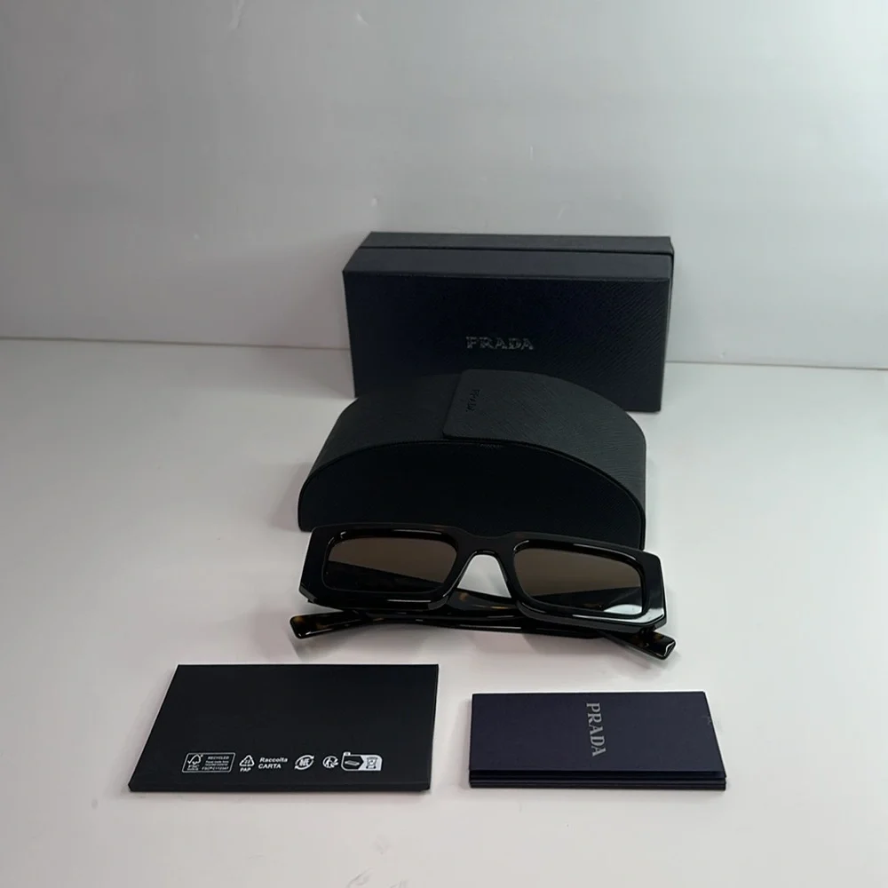 Prada PR06YS Brown Sunglasses with Bold Frames and UV Protection